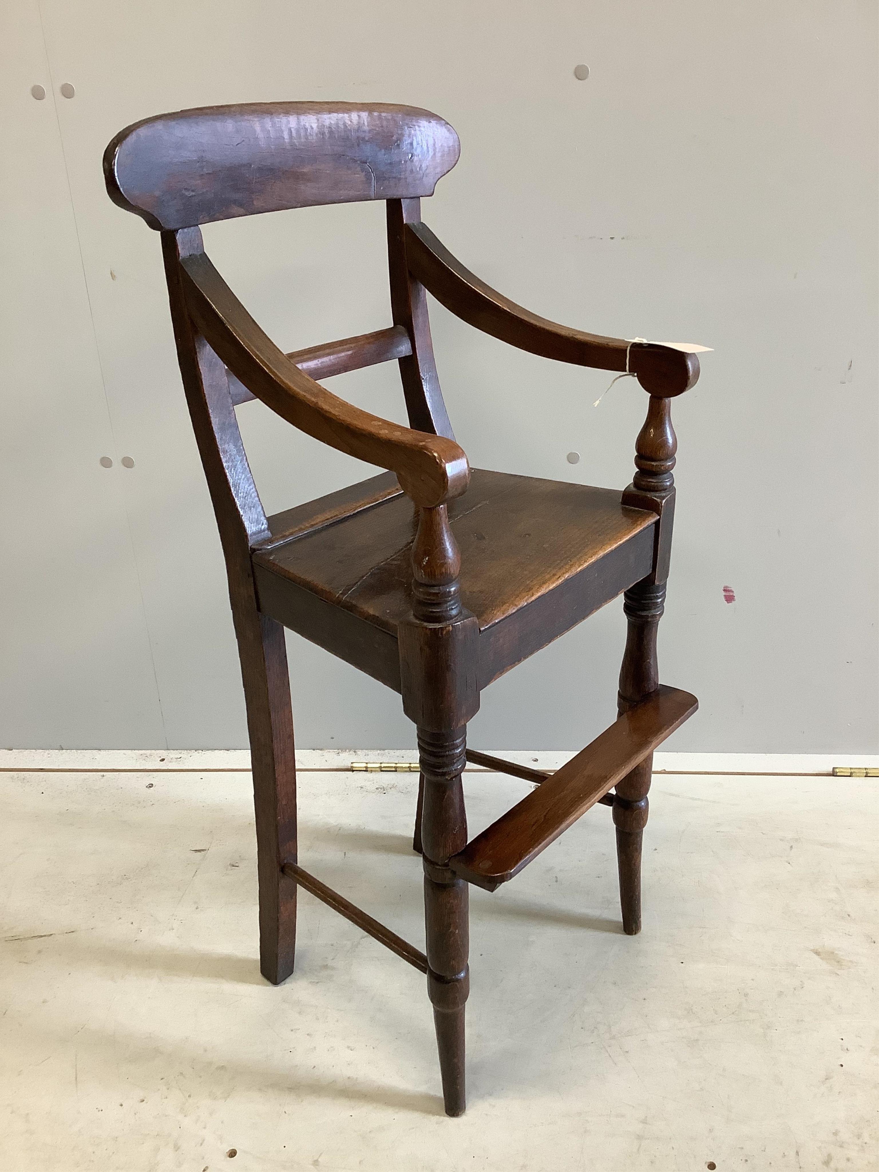 A Regency Provincial oak child's high chair width 34cm, depth 32cm, height 88cm. Condition good